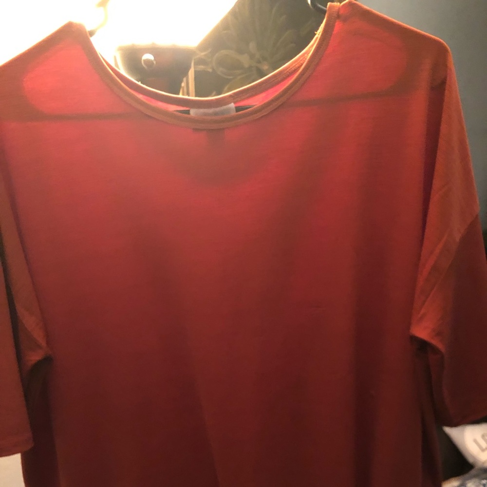 Small solid orange Irma